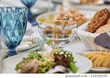 Elegant dining spread with gourmet delights Elegant dining spread with gourmet delights 139500345