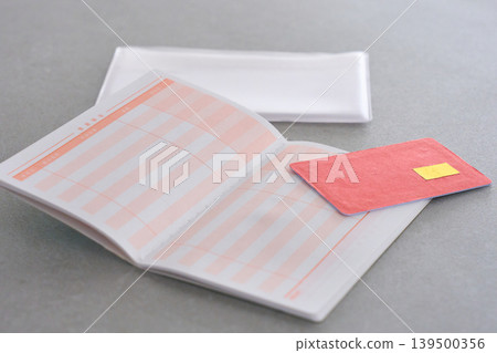 A bank passbook placed on the table A bank passbook placed on the table 139500356