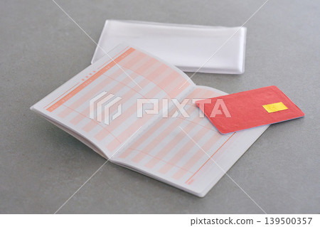 A bank passbook placed on the table A bank passbook placed on the table 139500357