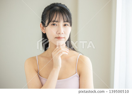 A young woman doing skin care A young woman doing skin care 139500510