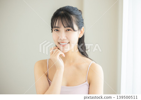 A young woman doing skin care A young woman doing skin care 139500511