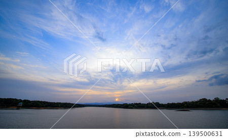 Sunset reflected in a reservoir Sunset reflected in a reservoir 139500631