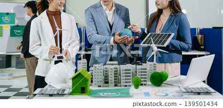 business team people planning and discussing on recycle reduce reuse policy symbol in office meeting room. Green business company and Solar Energy Environment city business team people planning and discussing on recycle reduce reuse policy symbol in office meeting room. Green business company and Solar Energy Environment city 139501434