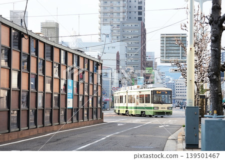 A streetcar entering the Senda depot from the Hiroshima Electric Railway main line (near the Hiroden Head Office stop) A streetcar entering the Senda depot from the Hiroshima Electric Railway main line (near the Hiroden Head Office stop) 139501467