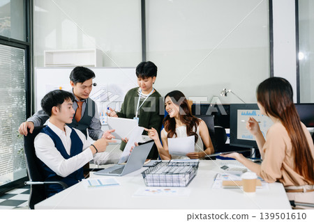 Asian startup business team collaborating in office meeting, discussing strategy, planning projects, and driving innovation 139501610