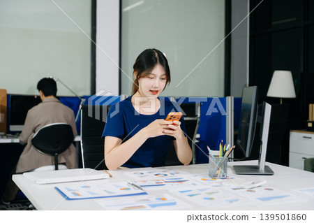 Business woman using tablet and laptop for doing math finance on an office desk, tax, report, accounting, statistics 139501860