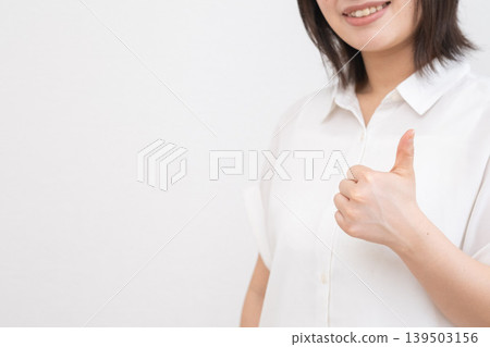 A young woman doing a good sign A young woman doing a good sign 139503156