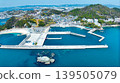 A view of Tanoura Fishing Port from the air. A drone captures a panoramic view of Tanoura Fishing Port in Wakayama, famous for fishing. 139505079