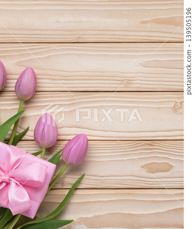 Mother's Day gift pink tulips flat lay Mother's Day gift pink tulips flat lay 139505196