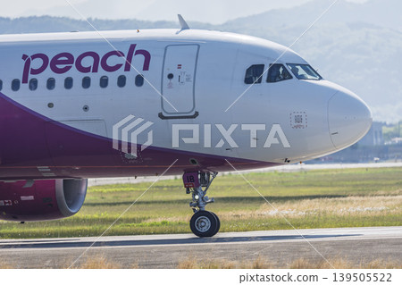 Sendai Airport at dusk, plane taxiing, Natori City, Miyagi Prefecture 139505522