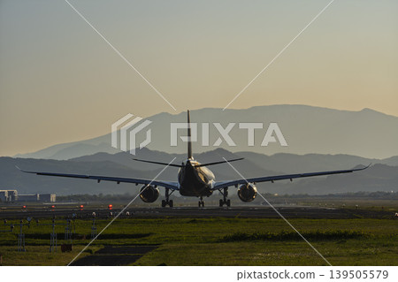 Sendai Airport at dusk, airplane taking off, Natori City, Miyagi Prefecture 139505579