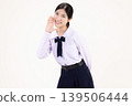 Happy Asian high school student girl in Thai school uniform shouting and announcing with hand around mouth, isolated on white background. 139506444