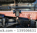 The heavy piping and rivets of the steam locomotive give it an industrial feel. 139506631