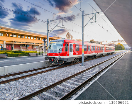 Brasov, Romania. Main train station platform and red raildcar 139506931