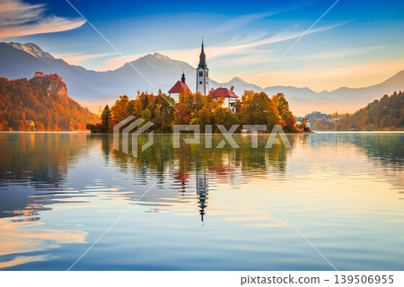 Bled, Slovenia. Autumn golden colors surrounding iconic Lake Bled Bled, Slovenia. Autumn golden colors surrounding iconic Lake Bled 139506955