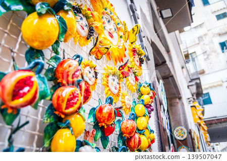 Amlfi, Italy. Vibrant ceramics and lemons on a traditional shop wall 139507047