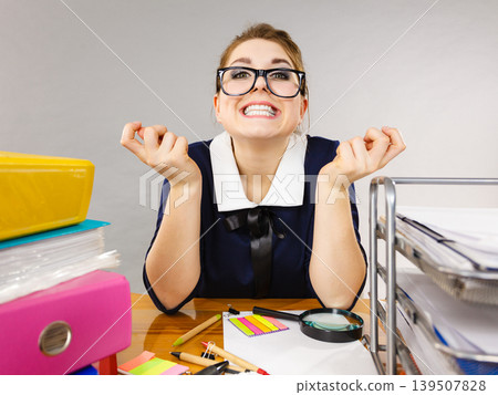 Happy business woman in office Happy business woman in office 139507828