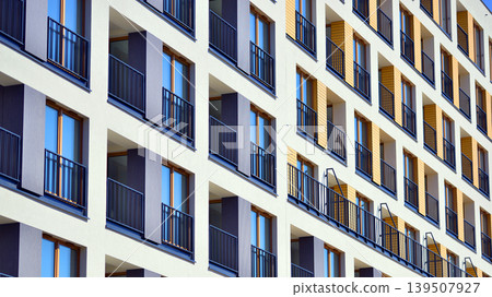 Downtown modern residential architecture. Architectural details of modern apartment building. Modern european residential apartment building complex. Downtown modern residential architecture. Architectural details of modern apartment building. Modern european residential apartment building complex. 139507927