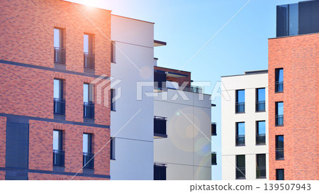 Downtown modern residential architecture. Architectural details of modern apartment building. Modern european residential apartment building complex. Downtown modern residential architecture. Architectural details of modern apartment building. Modern european residential apartment building complex. 139507943