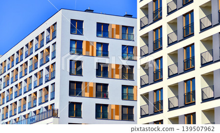 Downtown modern residential architecture. Architectural details of modern apartment building. Modern european residential apartment building complex. Downtown modern residential architecture. Architectural details of modern apartment building. Modern european residential apartment building complex. 139507962
