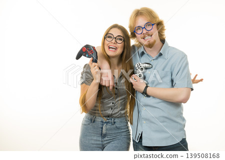 Gaming couple playing games Gaming couple playing games 139508168