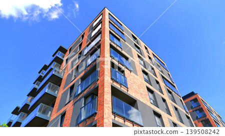 Downtown modern residential architecture. Architectural details of modern apartment building. Modern european residential apartment building complex. Downtown modern residential architecture. Architectural details of modern apartment building. Modern european residential apartment building complex. 139508242