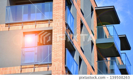 Downtown modern residential architecture. Architectural details of modern apartment building. Modern european residential apartment building complex. Downtown modern residential architecture. Architectural details of modern apartment building. Modern european residential apartment building complex. 139508263