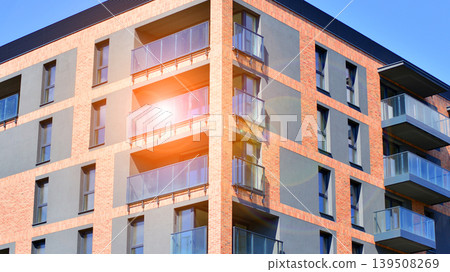 Downtown modern residential architecture. Architectural details of modern apartment building. Modern european residential apartment building complex. 139508269