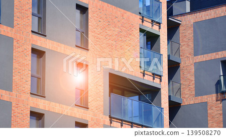 Downtown modern residential architecture. Architectural details of modern apartment building. Modern european residential apartment building complex. Downtown modern residential architecture. Architectural details of modern apartment building. Modern european residential apartment building complex. 139508270