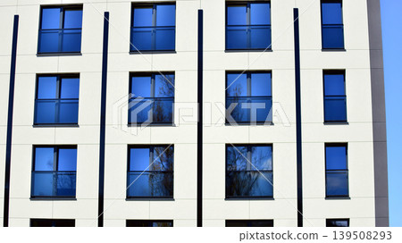 Downtown modern residential architecture. Architectural details of modern apartment building. Modern european residential apartment building complex. Downtown modern residential architecture. Architectural details of modern apartment building. Modern european residential apartment building complex. 139508293