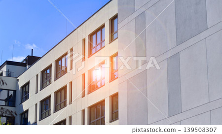 Downtown modern residential architecture. Architectural details of modern apartment building. Modern european residential apartment building complex. Downtown modern residential architecture. Architectural details of modern apartment building. Modern european residential apartment building complex. 139508307