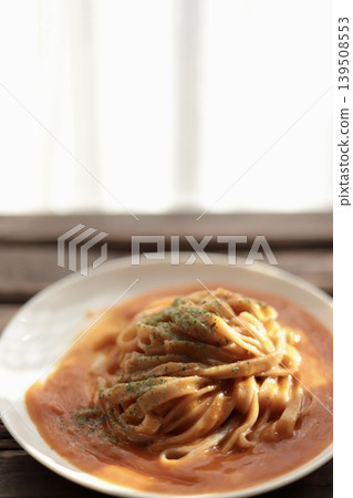 Crab and tomato cream pasta made with flat brown rice noodles (gluten-free noodles) Crab and tomato cream pasta made with flat brown rice noodles (gluten-free noodles) 139508553
