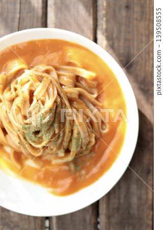 Crab and tomato cream pasta made with flat brown rice noodles (gluten-free noodles) Crab and tomato cream pasta made with flat brown rice noodles (gluten-free noodles) 139508555