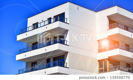 Downtown modern residential architecture. Architectural details of modern apartment building. Modern european residential apartment building complex. Downtown modern residential architecture. Architectural details of modern apartment building. Modern european residential apartment building complex. 139508770