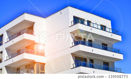 Downtown modern residential architecture. Architectural details of modern apartment building. Modern european residential apartment building complex. Downtown modern residential architecture. Architectural details of modern apartment building. Modern european residential apartment building complex. 139508773