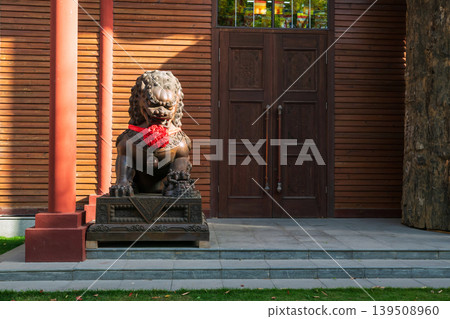 Chinese guardian lion at Longhua temple in Shanghai 139508960