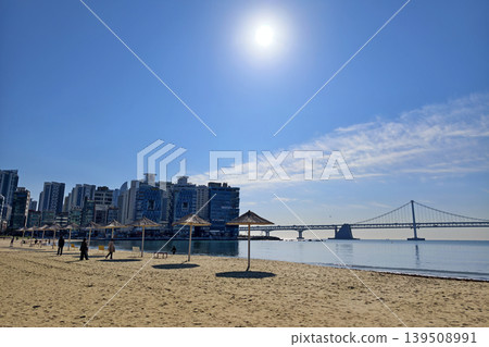 People at Gwangalli Beach with view of Gwangan Bridge, Busan People at Gwangalli Beach with view of Gwangan Bridge, Busan 139508991