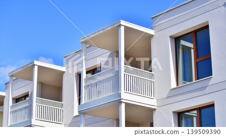 Downtown modern residential architecture. Architectural details of modern apartment building. Modern european residential apartment building complex. Downtown modern residential architecture. Architectural details of modern apartment building. Modern european residential apartment building complex. 139509390