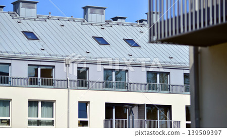Downtown modern residential architecture. Architectural details of modern apartment building. Modern european residential apartment building complex. Downtown modern residential architecture. Architectural details of modern apartment building. Modern european residential apartment building complex. 139509397