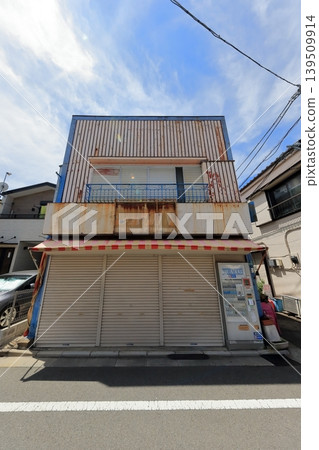 Image of a shop with its shutters closed. Image of a shop with its shutters closed. 139509914