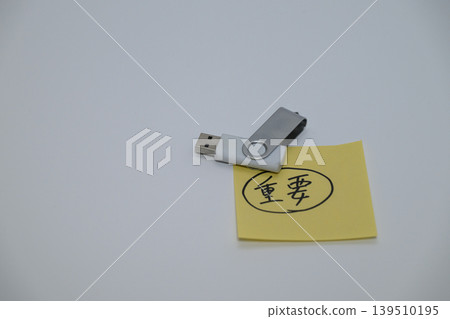 USB memory stick with important notes attached USB memory stick with important notes attached 139510195
