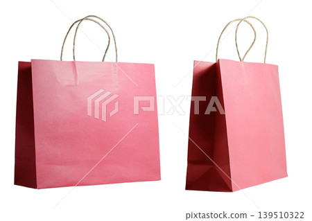 Pink Paper Shopping Bags Isolated on White. Isolated Background. Shopping, retail and Commerce Concept. High quality photo 139510322