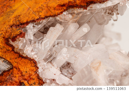 Macro mineral stone crystals Hemimorphite rock on a white background 139511063