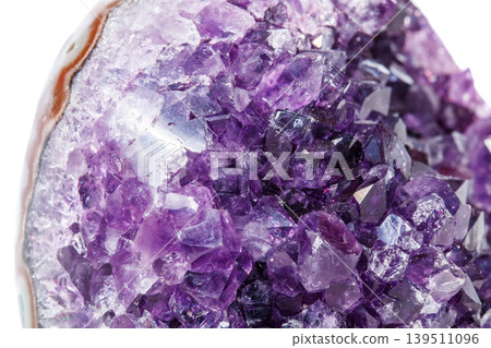 Amethyst Crystal Druse macro mineral on white background Amethyst Crystal Druse macro mineral on white background 139511096