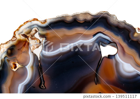 Macro mineral stone Yellow, brown Agate breed a white background Macro mineral stone Yellow, brown Agate breed a white background 139511117