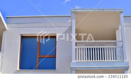 Downtown modern residential architecture. Architectural details of modern apartment building. Modern european residential apartment building complex. Downtown modern residential architecture. Architectural details of modern apartment building. Modern european residential apartment building complex. 139511185