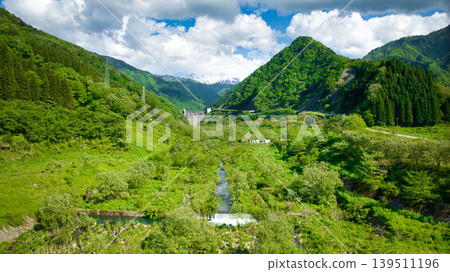 In May, snowmelt water flows through a small stream in eastern Toyama Prefecture. In May, snowmelt water flows through a small stream in eastern Toyama Prefecture. 139511196