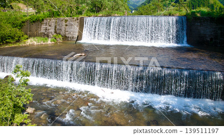 In May, snowmelt water flows through a small stream in eastern Toyama Prefecture. In May, snowmelt water flows through a small stream in eastern Toyama Prefecture. 139511197