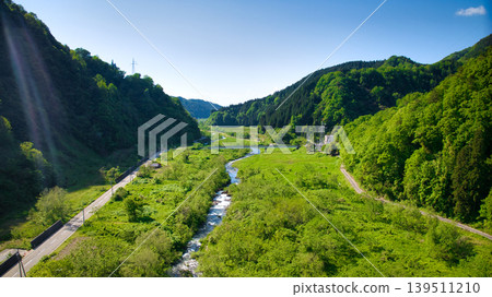In May, snowmelt water flows through a small stream in eastern Toyama Prefecture. In May, snowmelt water flows through a small stream in eastern Toyama Prefecture. 139511210