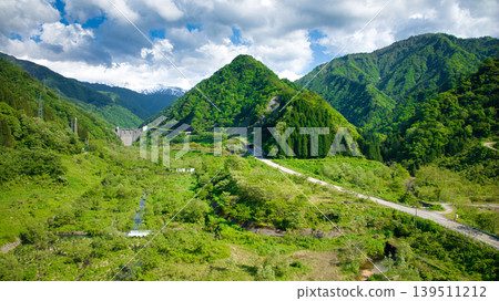 In May, snowmelt water flows through a small stream in eastern Toyama Prefecture. In May, snowmelt water flows through a small stream in eastern Toyama Prefecture. 139511212